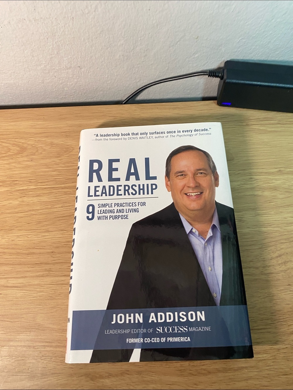 Real Leadership by John Addison — White & Navy Hardcover